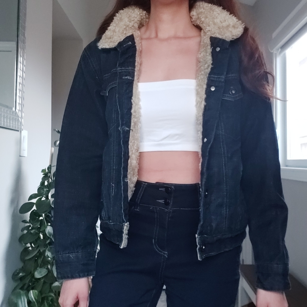 Denim jacket with faux fur lining.